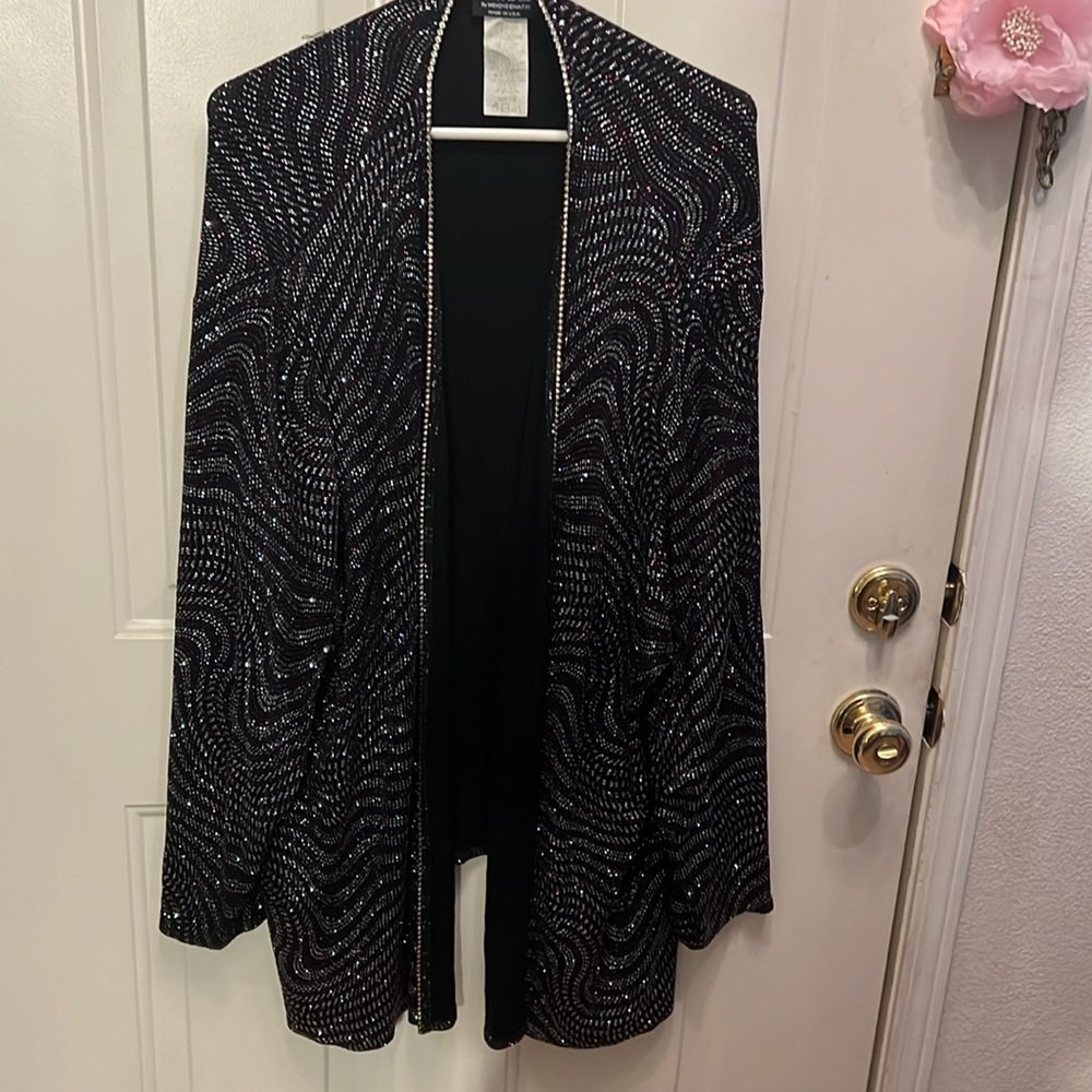 Lovely sparkling dress up jacket. Very fancy. SizexCO for size. I’m 2X.